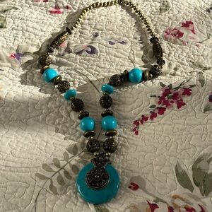Unique necklace (brand new). Brigh turquoise color.